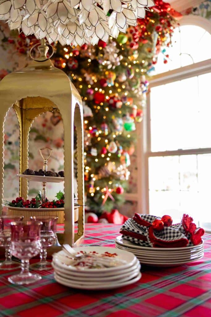 Christmas tree decorating: An upside down Christmas tree in a dining room.