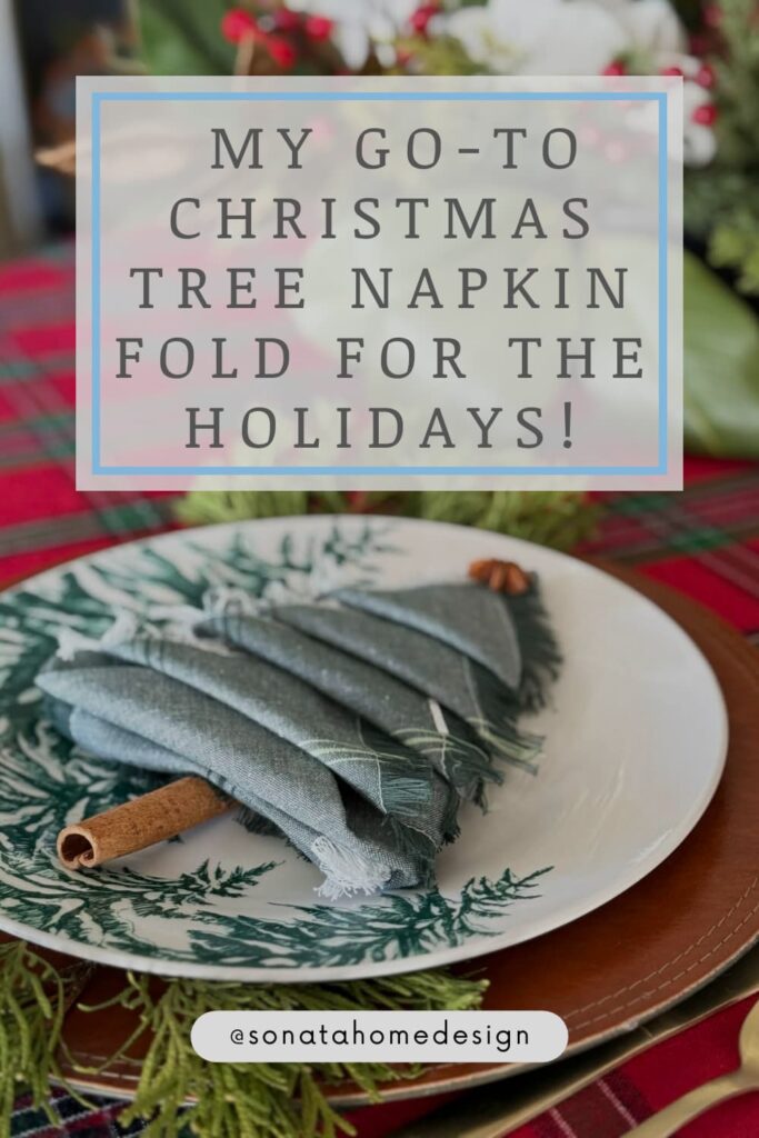 A Christmas tree napkin fold Pinterest pin.