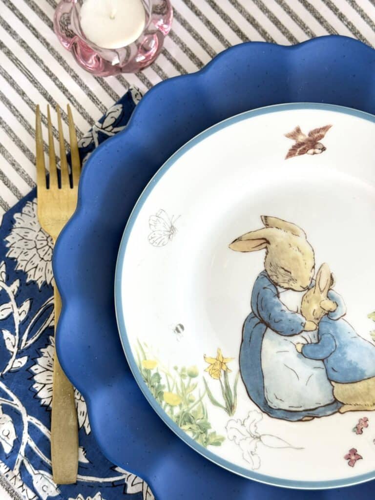 A bunny themed plate set on a spring table.
