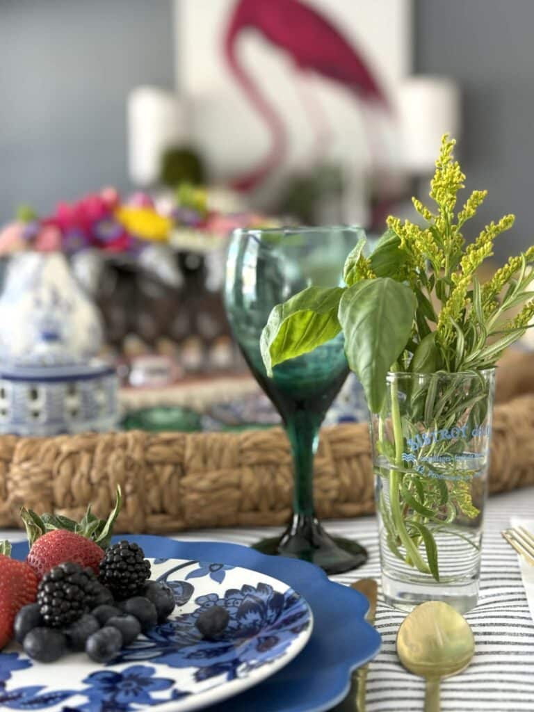 Fresh spring herb bouquets placed at each place setting on a table.
