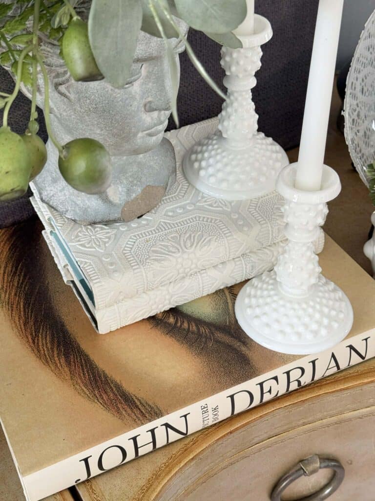 Wallpaper covered books stacked on top of each other.
