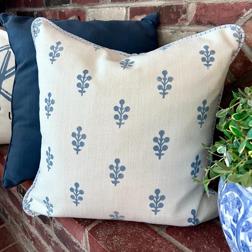 A block printed pillow created by South House Designs.