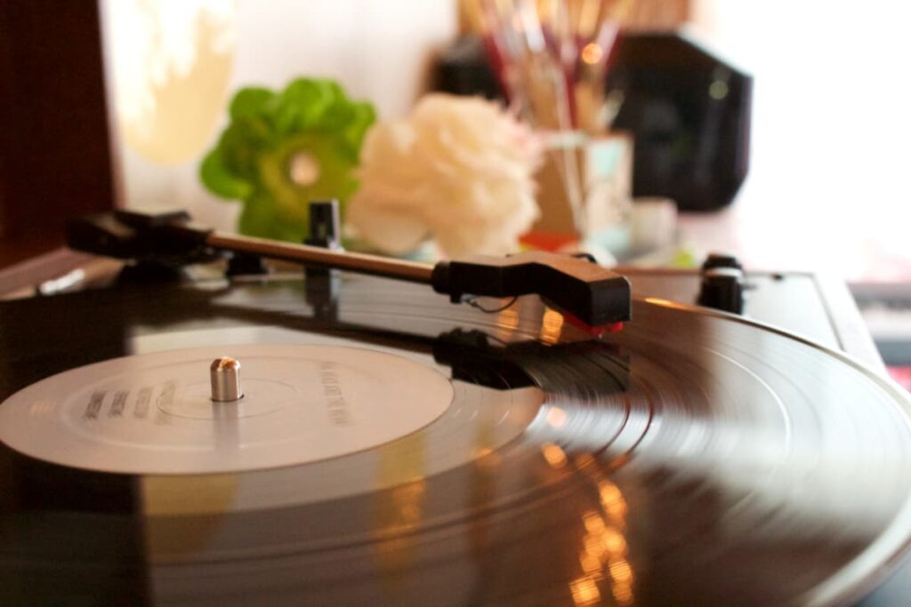 A vinyl record playing on a record player.