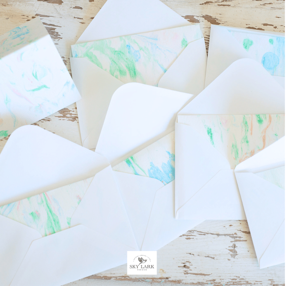 Handmade marbled cards using shaving cream.