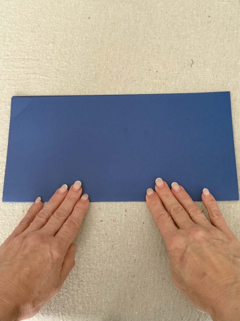 card stock paper folded in half.