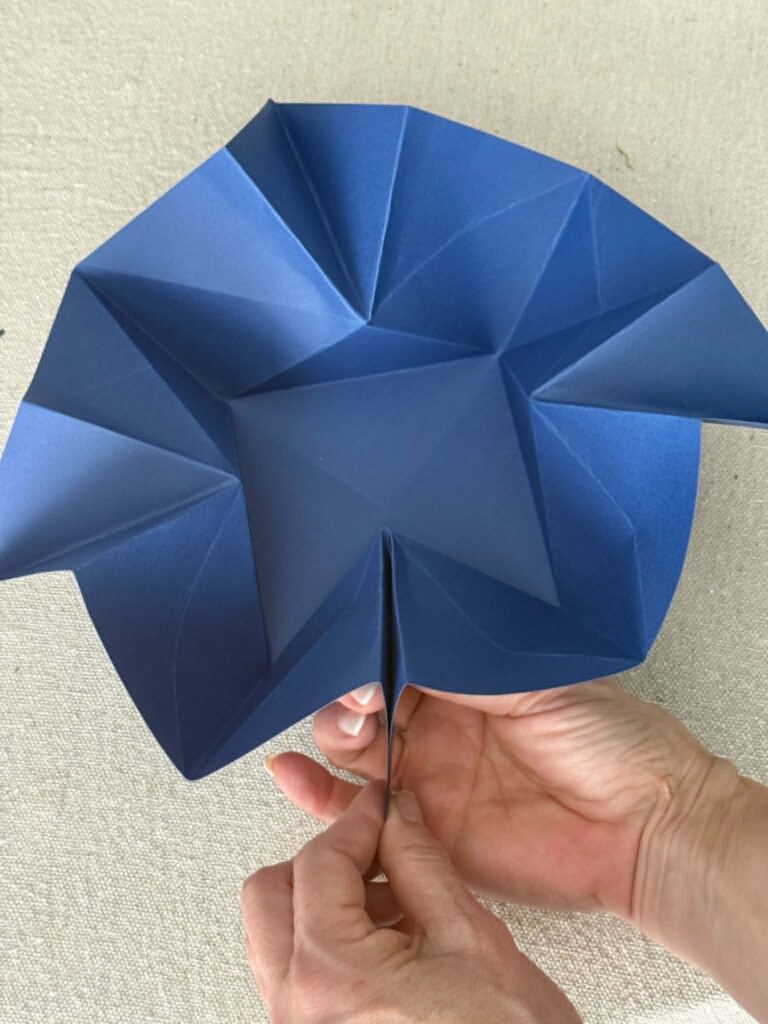 Corner folds for an origami envelope.