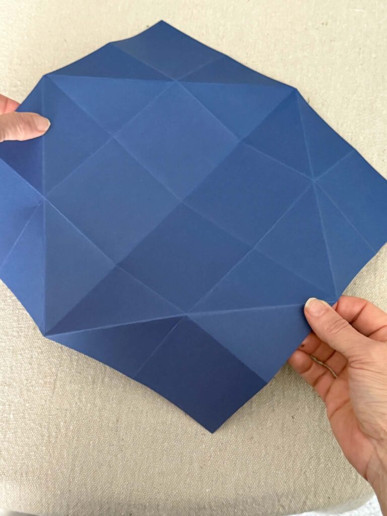 Origami folds in card stock.
