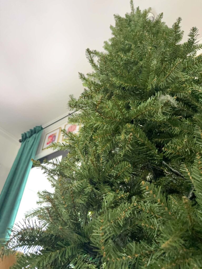 A nine foot artificial Christmas tree.