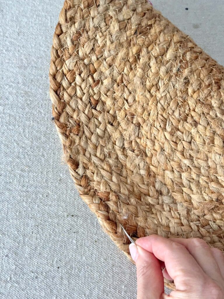 Pinning a woven placement that has bee folded in half.