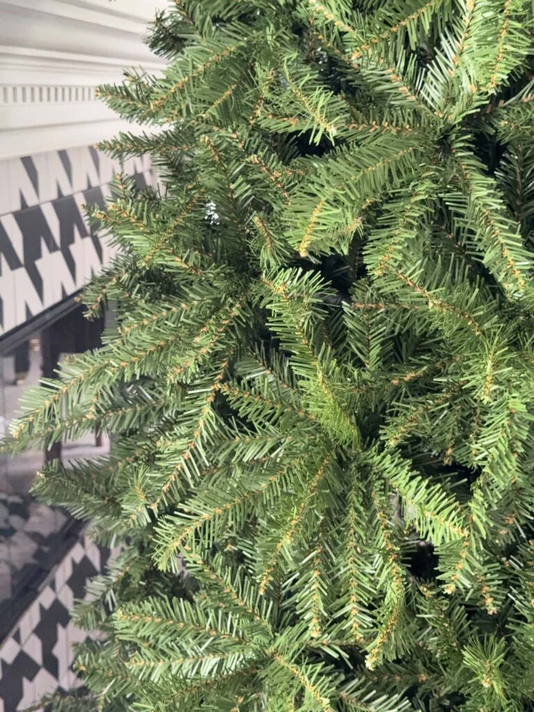 Thick branches of a Yorkshire Pine artificial Christmas tree.