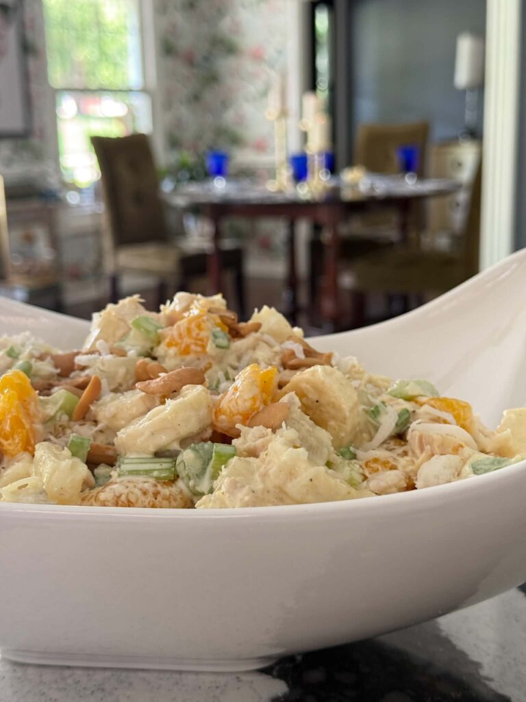 Curry chicken salad covered with cashews.
