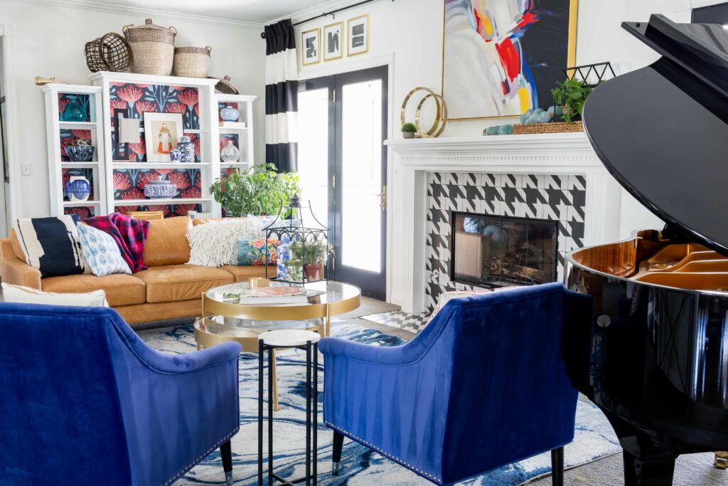 A living room styled through slow decorating with texture, layers, and no electronics.