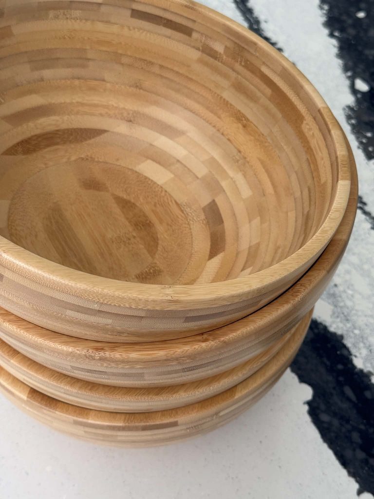 A stack of four BLAND MATT salad bowls from IKEA.