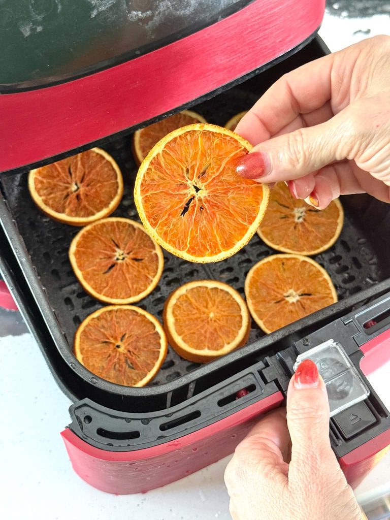 Drying orange slices in an air fryer.